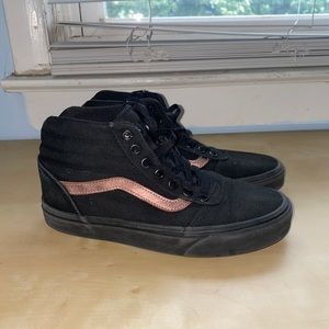 Black Vans with rose gold detail